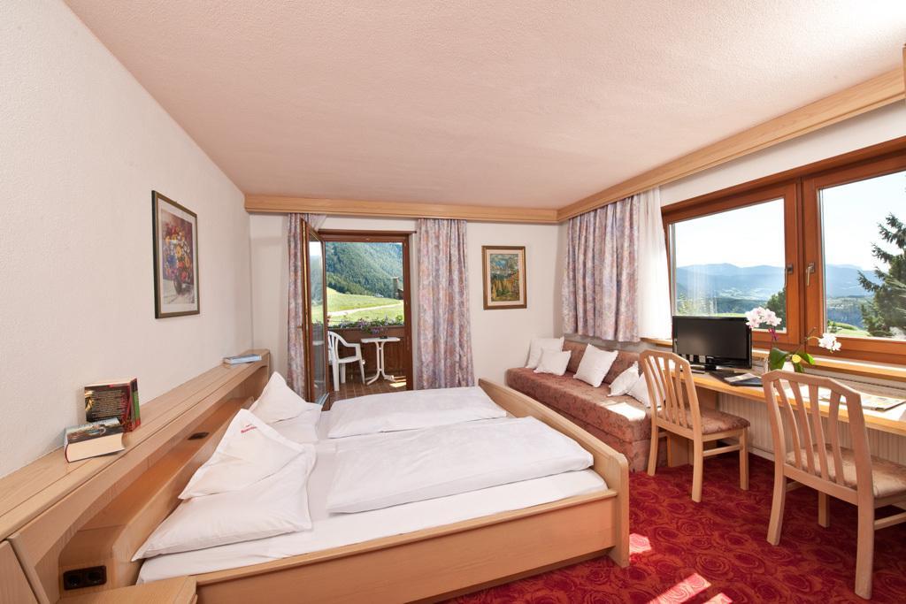 Hotel Rosenheim Rodengo Pokoj fotografie